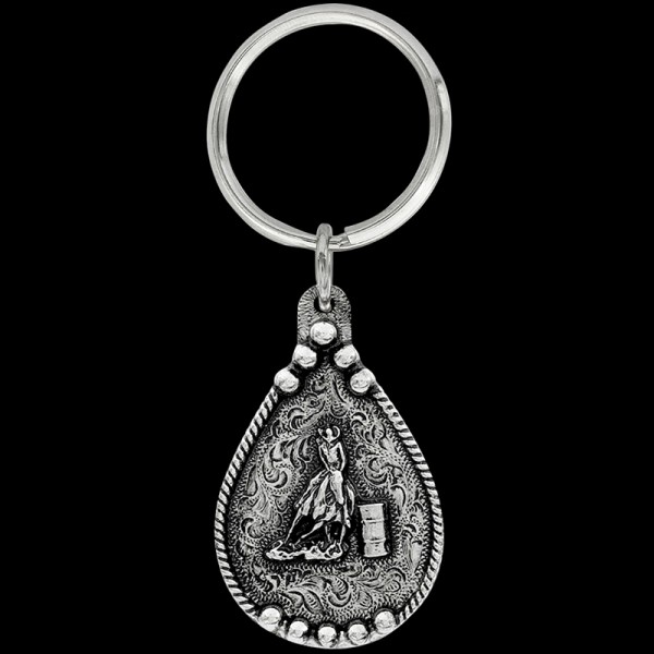 Capture the thrill of barrel racing with our Barrel Racing Keychain. Designed for horse enthusiasts and rodeo lovers alike, this finely crafted accessory is a perfect way to showcase your passion for the sport. Add a touch of Western flair to your keys wi